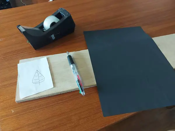 Tape, graphite paper, pen, pattern, wood